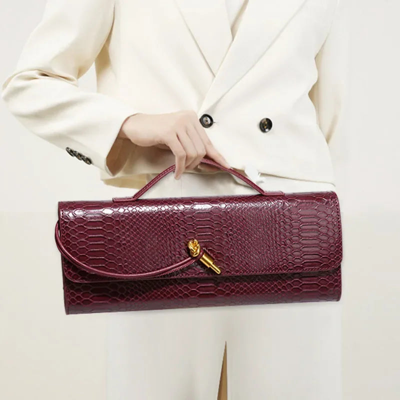 Sammi | Clutch in Schlangenoptik