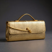 Sammi | Clutch in Schlangenoptik