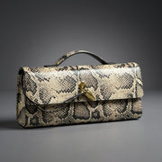 Sammi | Clutch in Schlangenoptik